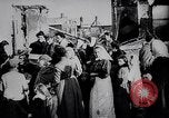 Image of British soldier reads news to civilians Europe, 1918, second 6 stock footage video 65675039557