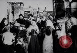 Image of British soldier reads news to civilians Europe, 1918, second 7 stock footage video 65675039557