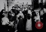 Image of British soldier reads news to civilians Europe, 1918, second 10 stock footage video 65675039557