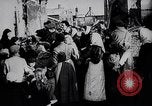 Image of British soldier reads news to civilians Europe, 1918, second 13 stock footage video 65675039557