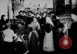 Image of British soldier reads news to civilians Europe, 1918, second 14 stock footage video 65675039557