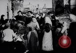 Image of British soldier reads news to civilians Europe, 1918, second 15 stock footage video 65675039557