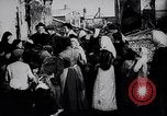 Image of British soldier reads news to civilians Europe, 1918, second 16 stock footage video 65675039557