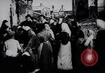 Image of British soldier reads news to civilians Europe, 1918, second 17 stock footage video 65675039557