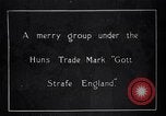 Image of British soldier reads news to civilians Europe, 1918, second 19 stock footage video 65675039557