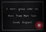 Image of British soldier reads news to civilians Europe, 1918, second 21 stock footage video 65675039557