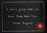Image of British soldier reads news to civilians Europe, 1918, second 22 stock footage video 65675039557