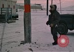Standbild linemen Thule Air Force Base Grönland, 1962, aus Sekunde 45 historischem Filmmaterial Videoclip 65675039573