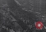 Image of crowds celebrate armistice ending World War 1 New York City USA, 1918, second 13 stock footage video 65675039606
