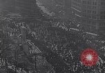 Image of crowds celebrate armistice ending World War 1 New York City USA, 1918, second 16 stock footage video 65675039606