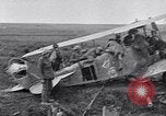 Image of Wrecked German biplane airplane in World War I France, 1918, second 8 stock footage video 65675039651