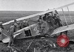 Image of Wrecked German biplane airplane in World War I France, 1918, second 13 stock footage video 65675039651