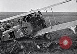 Image of Wrecked German biplane airplane in World War I France, 1918, second 18 stock footage video 65675039651