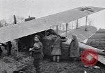 Image of Wrecked German biplane airplane in World War I France, 1918, second 47 stock footage video 65675039651