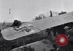 Image of Wrecked German biplane airplane in World War I France, 1918, second 57 stock footage video 65675039651