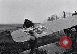 Image of Wrecked German biplane airplane in World War I France, 1918, second 60 stock footage video 65675039651