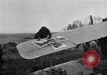 Image of Wrecked German biplane airplane in World War I France, 1918, second 62 stock footage video 65675039651