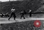 Image of American soldiers playing baseball Heidelberg Germany, 1945, second 52 stock footage video 65675039710