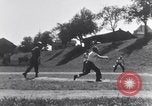 Image of American soldiers playing baseball Heidelberg Germany, 1945, second 56 stock footage video 65675039710
