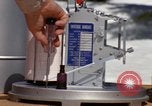Standbild Techniker installieren Regenmesser Olympia Washington USA, 1966, aus Sekunde 26 historischem Filmmaterial Videoclip 65675039729