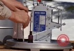 Standbild Techniker installieren Regenmesser Olympia Washington USA, 1966, aus Sekunde 28 historischem Filmmaterial Videoclip 65675039729