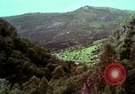 Image of Irish farmers digging potatoes Ireland, 1975, second 4 stock footage video 65675039766