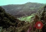 Image of Irish farmers digging potatoes Ireland, 1975, second 10 stock footage video 65675039766