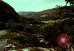 Image of Irish farmers digging potatoes Ireland, 1975, second 15 stock footage video 65675039766