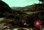 Image of Irish farmers digging potatoes Ireland, 1975, second 18 stock footage video 65675039766