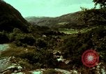Image of Irish farmers digging potatoes Ireland, 1975, second 21 stock footage video 65675039766