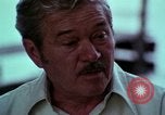 Image of Irish farmers digging potatoes Ireland, 1975, second 27 stock footage video 65675039766