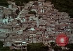 Image of Irish farmers digging potatoes Ireland, 1975, second 37 stock footage video 65675039766