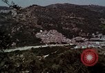 Image of Irish farmers digging potatoes Ireland, 1975, second 48 stock footage video 65675039766