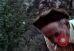 Image of Irish farmers digging potatoes Ireland, 1975, second 53 stock footage video 65675039766