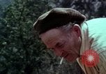 Image of Irish farmers digging potatoes Ireland, 1975, second 60 stock footage video 65675039766