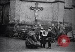 Image of American soldier giving chocolates to children France, 1918, second 6 stock footage video 65675039777