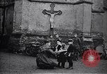 Image of American soldier giving chocolates to children France, 1918, second 11 stock footage video 65675039777