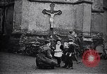 Image of American soldier giving chocolates to children France, 1918, second 16 stock footage video 65675039777