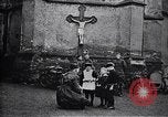 Image of American soldier giving chocolates to children France, 1918, second 20 stock footage video 65675039777