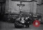 Image of American soldier giving chocolates to children France, 1918, second 21 stock footage video 65675039777