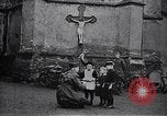 Image of American soldier giving chocolates to children France, 1918, second 22 stock footage video 65675039777