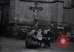 Image of American soldier giving chocolates to children France, 1918, second 23 stock footage video 65675039777