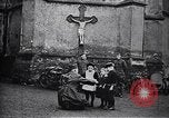 Image of American soldier giving chocolates to children France, 1918, second 25 stock footage video 65675039777