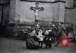 Image of American soldier giving chocolates to children France, 1918, second 26 stock footage video 65675039777