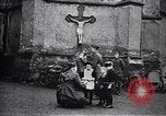 Image of American soldier giving chocolates to children France, 1918, second 27 stock footage video 65675039777