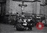 Image of American soldier giving chocolates to children France, 1918, second 28 stock footage video 65675039777