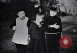 Image of American soldier giving chocolates to children France, 1918, second 49 stock footage video 65675039777