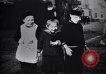 Image of American soldier giving chocolates to children France, 1918, second 51 stock footage video 65675039777