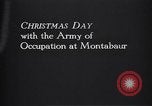 Image of American soldier giving chocolates to children France, 1918, second 53 stock footage video 65675039777