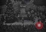 Image of American soldier giving chocolates to children France, 1918, second 57 stock footage video 65675039777